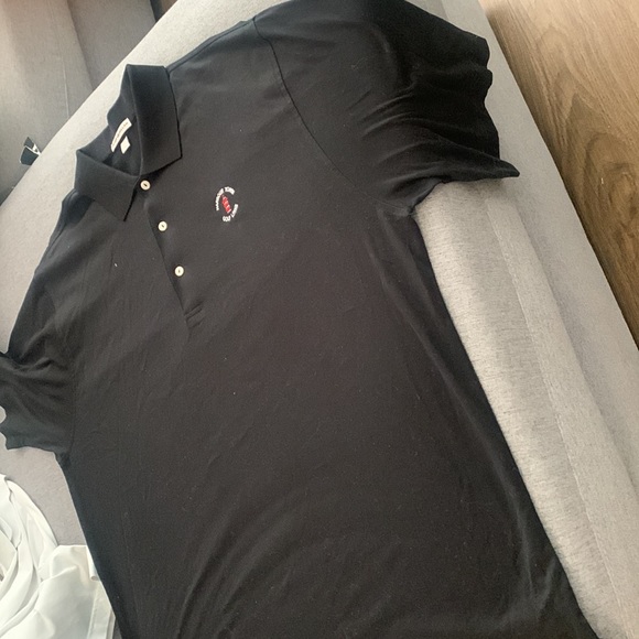 I have bundle pack of Peter Millar XL White is a Dri fit and Black is 100 cotton - Picture 9 of 9